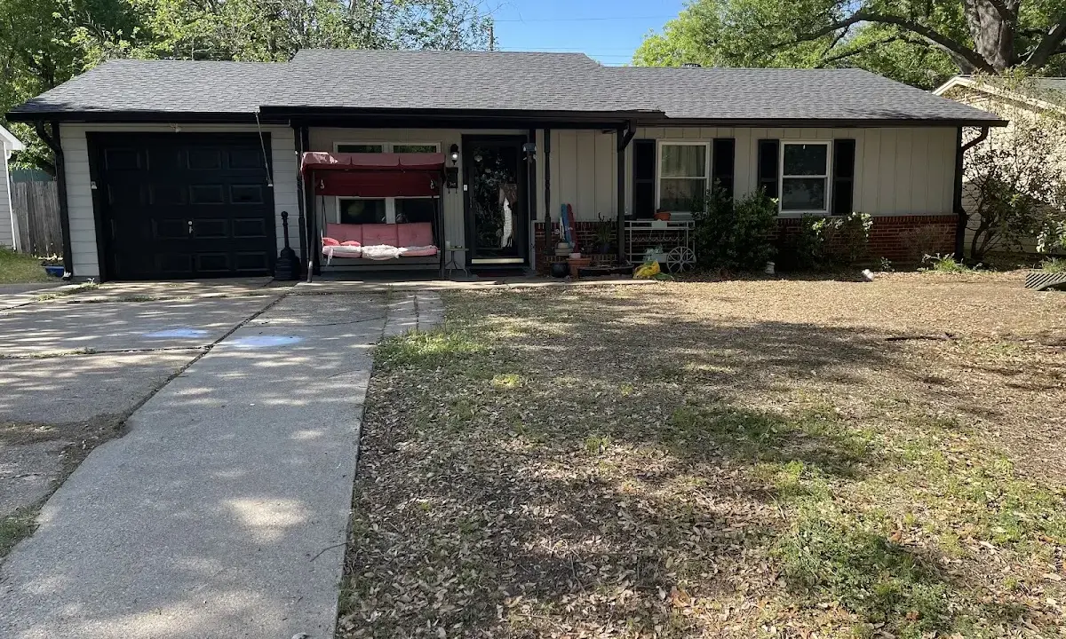 Asphalt Shingle Roof Repair crew at work on a residential roof in Hickory Creek